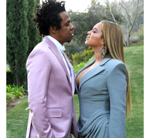 BREAKING: Beyonce Rocks $13K Gucci X Balenciaga Jacket and Gets Kissy With Jay-Z