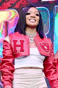 This afternoon, Cardi B and GloRilla announced their new collaboration, "Tomorrow 2." The Bronx rapper confirmed that she would be hopping on the remix of the record on Instagram, which will drop on Friday at midnight.
