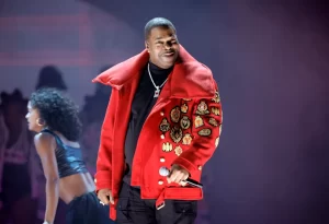 Busta Rhymes Gives Up-and-Coming Rapper Scar Lip a Diamond Chain and Advice on Staying True to Herself