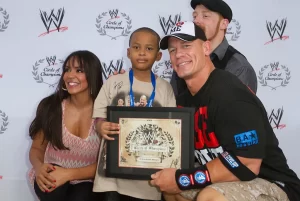 Cena is a Christian and a philanthropist. He is a supporter of the Make-A-Wish Foundation and has granted over 600 wishes. He is also a supporter of the Susan G. Komen Foundation and has raised money for breast cancer research.  Despite his wealth, Cena is notably philanthropic. He has granted over 650 wishes for the Make-A-Wish Foundation, more than any other individual in the organization’s history. While his philanthropic endeavors may not directly contribute to his net worth, they provide a broader perspective on how Cena uses his wealth.