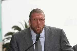 Triple H Biography and Net Worth 2023. Triple H Biography, family, career, Net Worth 2023. In the world of professional wrestling, few names command as much respect and recognition as Triple H. From his humble beginnings to becoming a WWE icon, Triple H’s journey has been nothing short of extraordinary. Triple H: A Biography Paul Michael Levesque, better known by his ring name Triple H, is an American professional wrestler, actor, and executive. He is currently the Executive Vice President of Global Talent Strategy & Development for WWE. Triple H was born on July 27, 1969, in Nashua, New Hampshire. He began his wrestling career in 1992, training under Killer Kowalski. He made his professional wrestling debut in 1995, wrestling for the World Wrestling Federation (WWF, now WWE). Triple H quickly rose through the ranks of the WWF, winning his first championship, the Intercontinental Championship, in 1997. He went on to win numerous other championships throughout his career, including the WWF/WWE Championship, the World Heavyweight Championship, and the Royal Rumble. Triple H is also known for being a member of the stable D-Generation X, which he co-founded with Shawn Michaels. D-Generation X was one of the most popular and successful factions in WWE history. Triple H retired from in-ring competition in 2022 due to health reasons. However, he remains an important figure in WWE, and he continues to work behind the scenes as an executive. Net Worth Triple H's net worth is estimated to be $170 million in 2023. His income comes from his wrestling career, his work as an executive, and his various business ventures. Family Triple H is married to Stephanie McMahon, the daughter of WWE chairman Vince McMahon. They have three daughters together: Aurora Rose, Murphy Claire, and Vaughn Evelyn. Career Highlights Triple H made his WWE debut in 1995, adopting the ring name Hunter Hearst Helmsley, later shortened to Triple H. His meteoric rise within the ranks of WWE began when he formed the notorious D-Generation X faction. This marked the beginning of his transformation into “The Game.” This moniker reflected his dominance and strategic prowess in the wrestling world. 14-time world champion (5-time WWF/WWE Champion, 9-time World Heavyweight Champion) 14-time Intercontinental Champion 2-time European Champion 3-time Tag Team Champion 2000 Royal Rumble winner Co-founder of D-Generation X Executive Vice President of Global Talent Strategy & Development for WWE Awards and Accomplishments Triple H etched his legacy in WWE history. He clinched numerous championships, including a staggering 14-time World Heavyweight Champion. His rivalries with legends like The Rock, Stone Cold Steve Austin, and The Undertaker are legendary battles that left an indelible mark on wrestling fans around the world. Beyond his in-ring accomplishments, he took on roles as an executive, creative director and producer within WWE, contributing to its ongoing success. WWE Hall of Fame (Class of 2019) 11-time Slammy Award winner 2000 Pro Wrestling Illustrated Wrestler of the Year 2000 Wrestling Observer Newsletter Most Improved Wrestler Personal Life Triple H is a car enthusiast and owns a collection of luxury cars. He is also a fan of the Boston Red Sox and the New England Patriots. Conclusion Triple H is one of the most successful professional wrestlers of all time. He has won numerous championships and accolades, and he has been a major part of WWE for over two decades. He is a true legend of the sport.