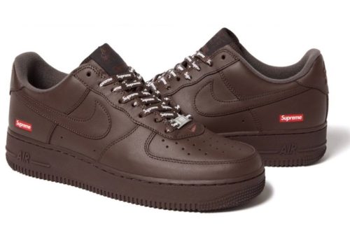 The sneakers feature a baroque brown rubber sole and a brown midsole. A baroque brown leather constructs the base of the uppers, with more brown overlays. Brown laces feature Supreme text all over, and a silver lace dubrae. The red Supreme box logo is found near the heels. Nike branding is found on the tongue and heels. Overall, Supreme and Nike teaming up is a huge collab and this pair is a clean colorway.
